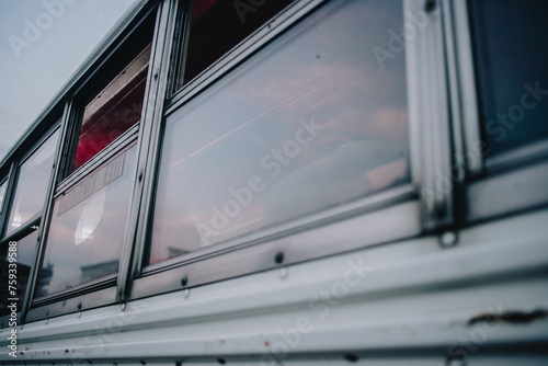 a passenger bus at the crack of dawn