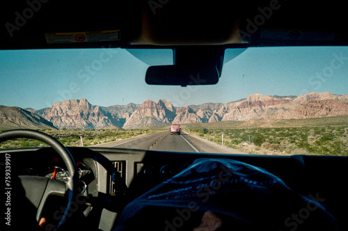 Film scan of view from vehicle driving towards Red Rocks Canyon  photo