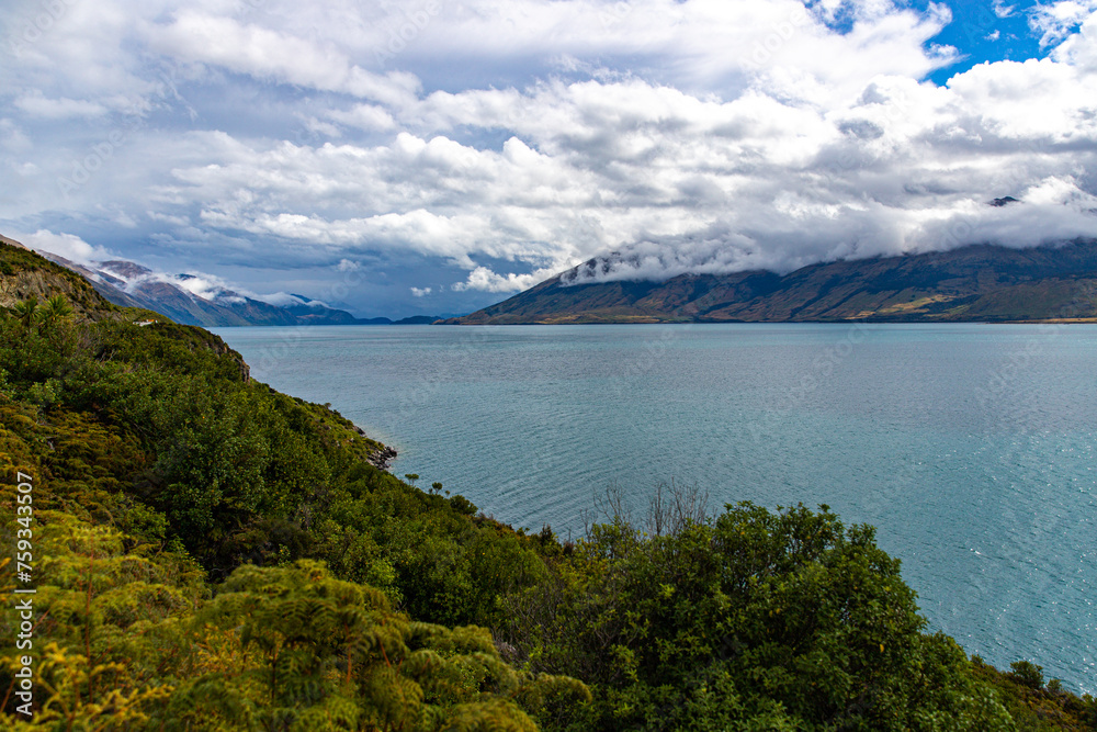 panorama of lake wanaka surrounded with rugged mountains; famous lake in otago, new zealand south island panorama of lake wanaka surrounded with rugged mountains; famous lake in otago, new zealand south island