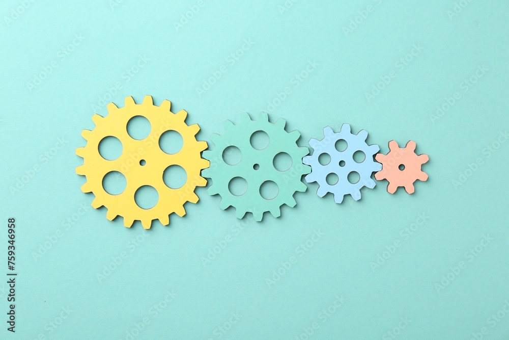Business process organization and optimization. Scheme with colorful figures on turquoise background, top view