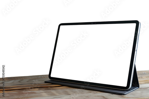 The tablet computer stands on the table with a blank white screen and transparent background. Screen display for mockup.