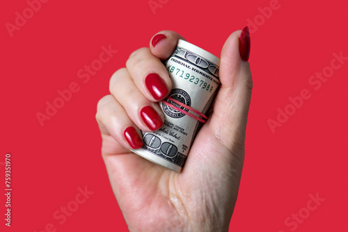 Hand holding money