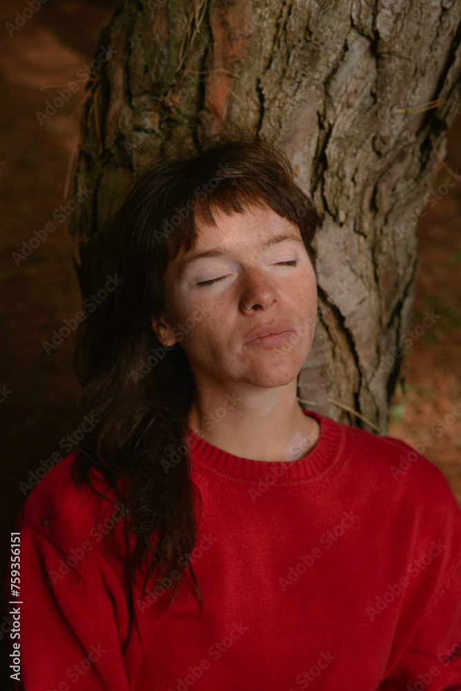 Calm and confident Woman portrait in the woods Calm and confident Woman portrait in the woods