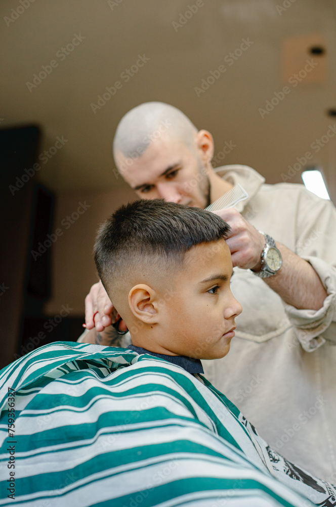 child's haircut at the barbershop child's haircut at the barbershop