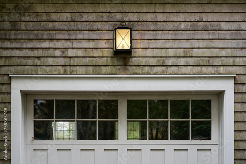 Cedar garage with lantern  photo