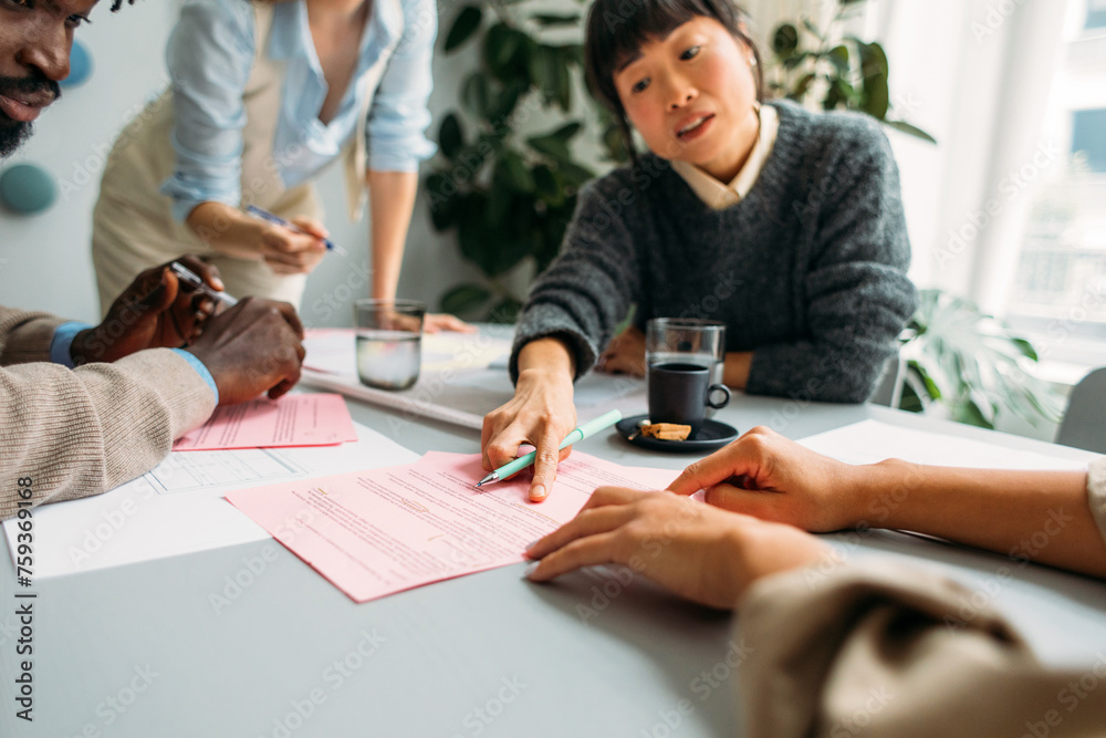© Studio Firma/Stocksy - Colleagues working on project