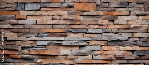Seamless textured background with brown slate stone wall pattern