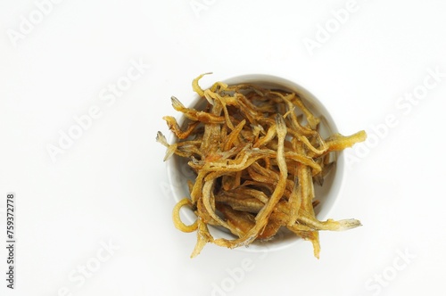 dried salted fish in a white bowl