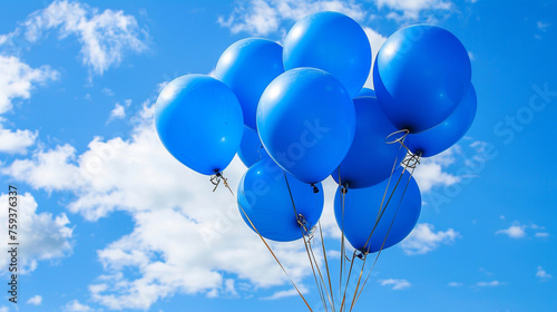 Azure blue balloons floating gracefully against a holiday sky, creating an atmosphere of tranquility.