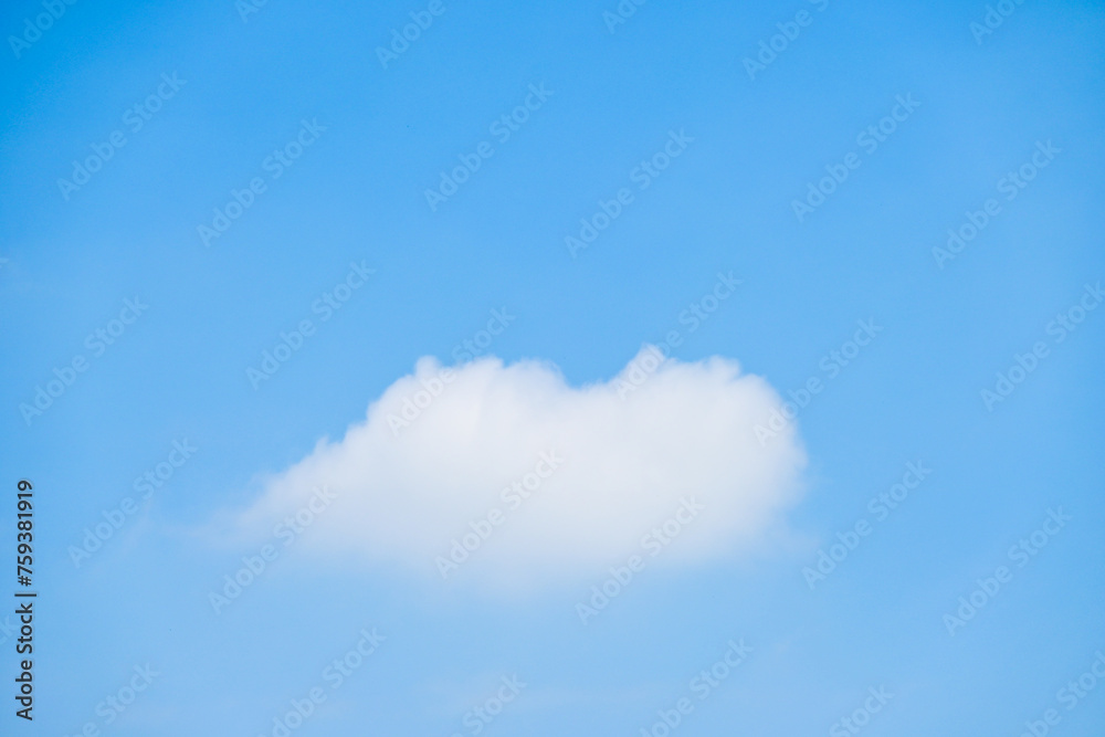 beautiful blue sky and white fluffy single cloud with sunrise in the morning, natural background beautiful blue sky and white fluffy single cloud with sunrise in the morning, natural background