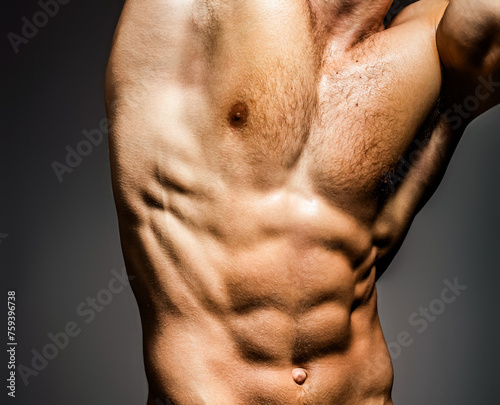 Male chest. Chest muscles. Muscled male torso with abs. Athletic Man showing muscular body and six pack. Muscular model. Sensual and sexy. Topless male model.