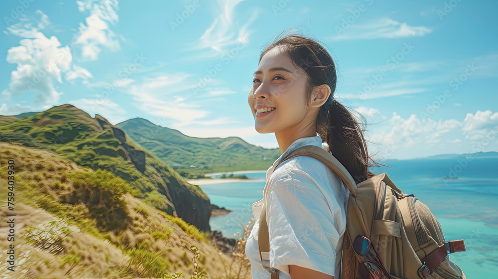 4K Young beautiful Asian woman with backpack solo travel on tropical island mountain peak in summer sunny day. Cheerful female relax and enjoy outdoor lifestyle in summer beach holiday vacation trip.