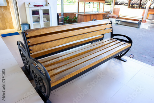 The elegance of wooden and metal long bench