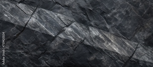 Black granite stone texture for seamless tiling. High quality image.