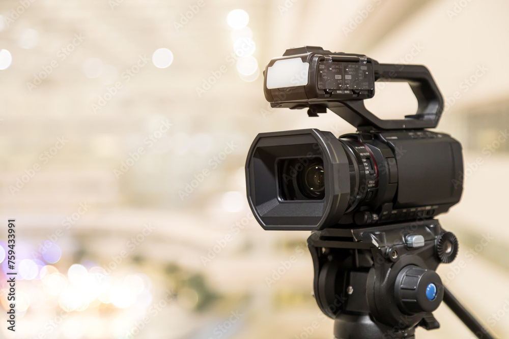 Video camera with blur background for journalist interview broadcasting reporter news or press conference speaker or public speaking or meeting report record and content creator live media concepts.