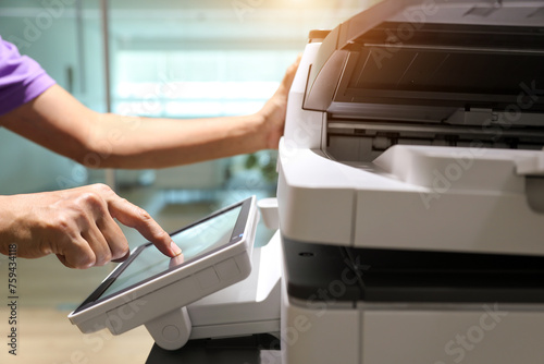 Hand use copier or photocopier or photocopy machine office equipment workplace for scanner or scanning document or printer for printing paperwork hard copy duplicate Xerox service maintenance repair.