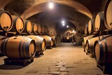 Close-up of Oak Barrels in a hungarian underground wine cellar. Wine cellar in Tokaj, Hungary. Wine barrels for advertising, banner, poster of wine shop