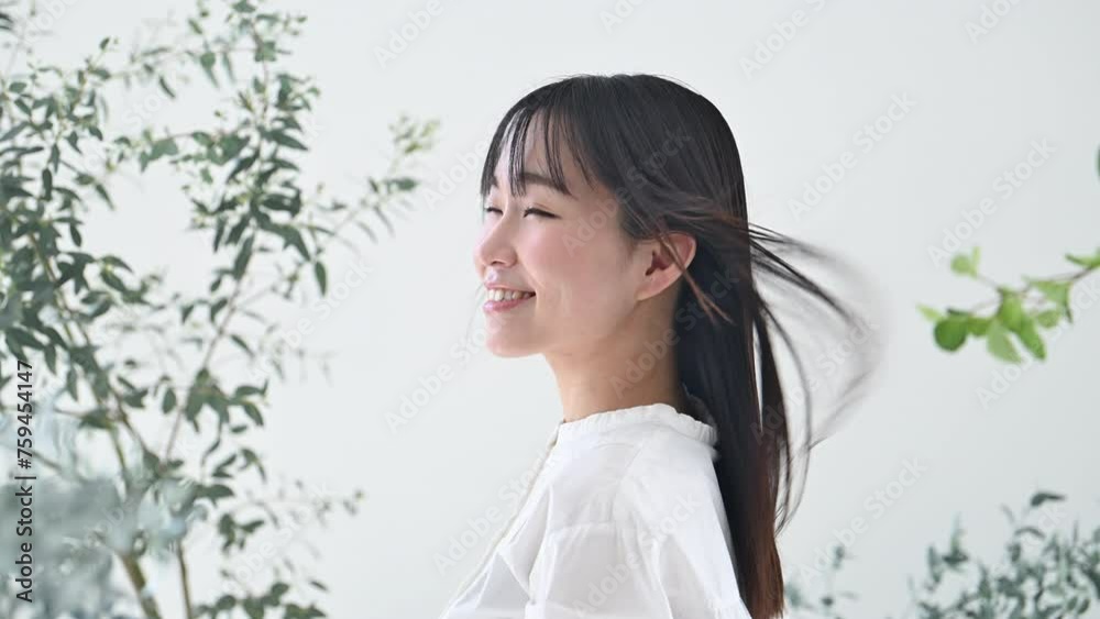 Beauty image of young women's hair fluttering with organic and natural image of greenery for hair care and skin care damage. Beauty image of young women's hair fluttering with organic and natural image of greenery for hair care and skin care damage.