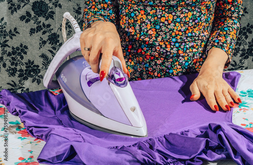 Ironing clothes. photo