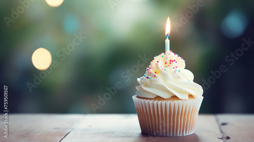 One single Happy birthday cupcake with a small candle. Cute  elegant celebration banner background with copy space.