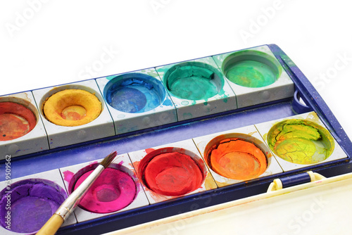 Art palette with paint and brush on white background. Learning and paintings art concept.