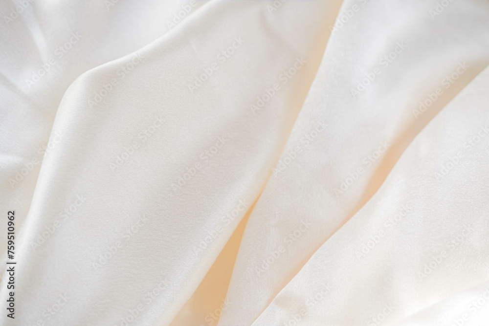 Abstract background of luxury fabric, folded textile or liquid wave or wavy folds silk texture satin material Abstract background of luxury fabric, folded textile or liquid wave or wavy folds silk texture satin material