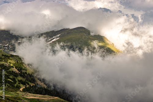 Dramatic clouds engulfing the mountains in Rocky Mountain National Park  Colorado