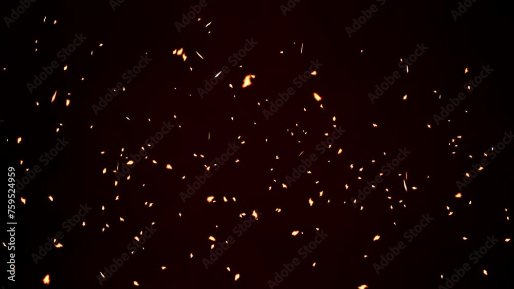 Sparks particles and burning embers of fire flying on a black background Sparks particles and burning embers of fire flying on a black background