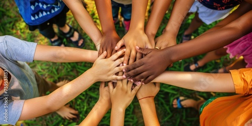 Group of hands with different color stack up, community program