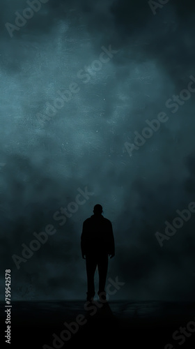 The silhouette of a lone figure against a dark backdrop  symbolizing solitude  mobile phone wallpaper