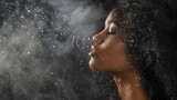 black female woman spraying mist on her face, profile picture of mist wter splashing all over ther face and hair. she has long curly hair, well dressed, her face is wet, she is spraying the mist with 