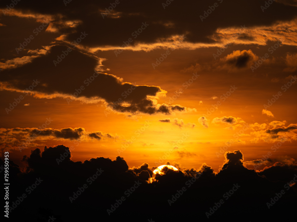 Yellow Sunset above The Dark Clouds