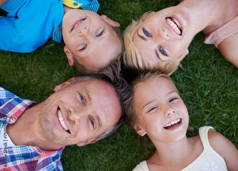 Parents, children and portrait on grass as family for holiday fun or traveling destination, environment or above. Men, woman and siblings in backyard for summer bonding in Australia, kids or love Parents, children and portrait on grass as family for holiday fun or traveling destination, environment or above. Men, woman and siblings in backyard for summer bonding in Australia, kids or love