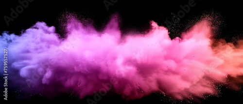  a multicolored cloud of powder flying in the air on a black background with space for text or image.