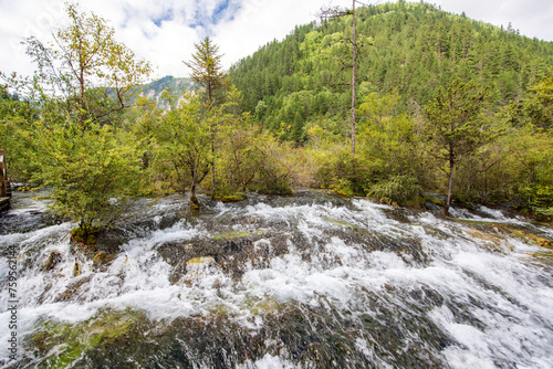 Beautiful scenery of mountains and flowing water in Jiuzhaigou Valley, Sichuan, China