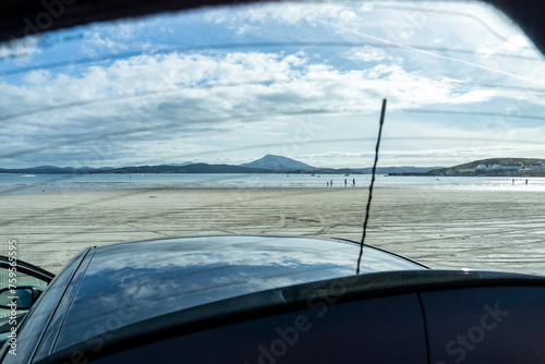 The beach in Downings seen through boot window of car, County Donegal, Ireland photo