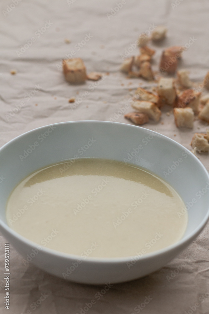 Fototapeta premium Leeks in a cream soup bowl.