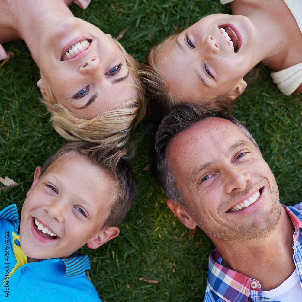 Parents, children and portrait on grass from above or family holiday or travel destination, environment or happiness. Men, woman and siblings in backyard for summer bonding in Australia, kids or love Parents, children and portrait on grass from above or family holiday or travel destination, environment or happiness. Men, woman and siblings in backyard for summer bonding in Australia, kids or love