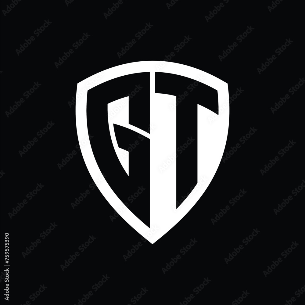GT monogram logo with bold letters shield shape with black and white color design GT monogram logo with bold letters shield shape with black and white color design
