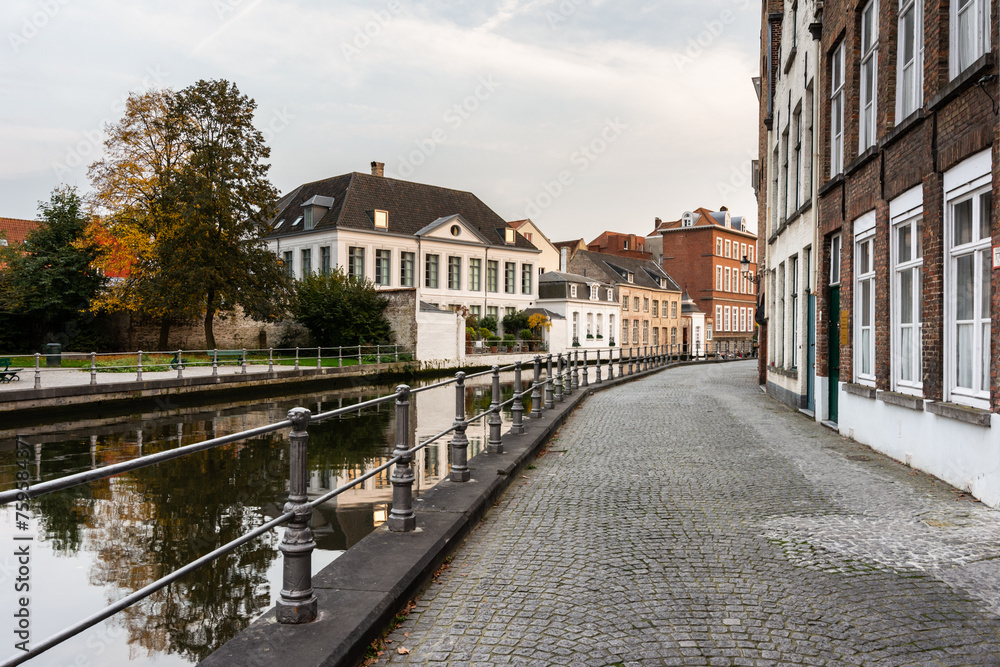 Cloudy autumn atmosphere in the centre of romantic city of Bruges in Belgium