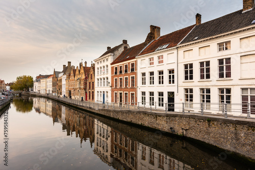 Cloudy autumn atmosphere in the centre of romantic city of Bruges in Belgium photo