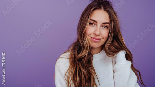 Woman’s warm smile radiates against a purple backdrop, embodying gentle charm.
