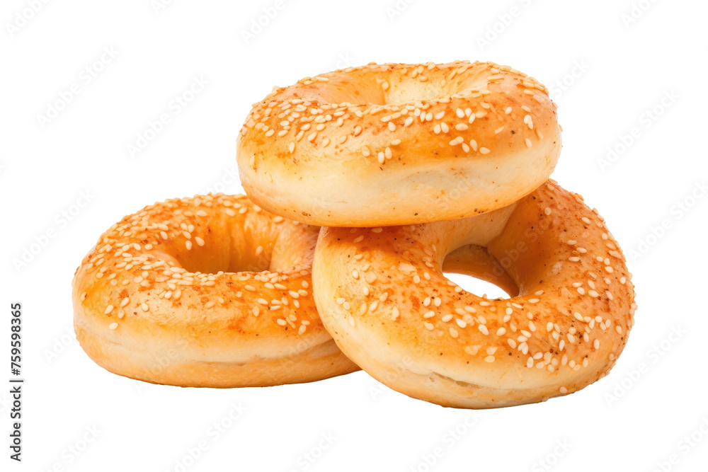 Three Sesame Bagels Stacked on Top. on a White or Clear Surface PNG Transparent Background.