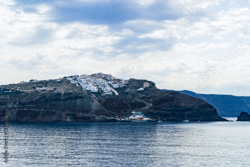 View of Oia town on Santorini island in Greece. Travel mediterranean aegean of traditional cycladic Santorini white houses