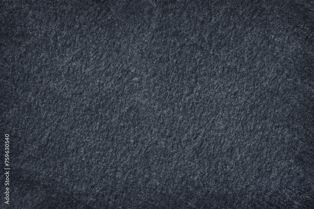 Dark grey stone / black slate stone background or texture Dark grey stone / black slate stone background or texture