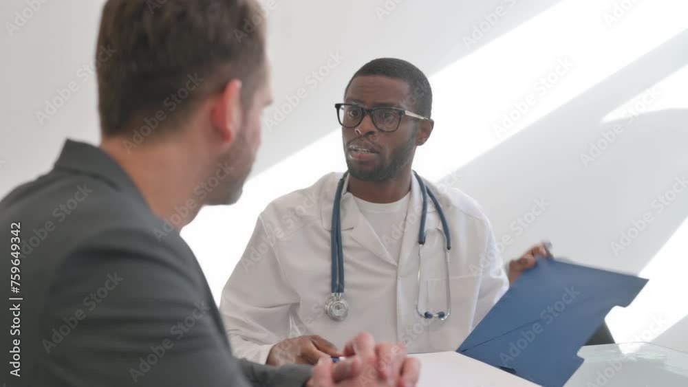 Close up of Doctor Talking with Patient in Clinic Close up of Doctor Talking with Patient in Clinic