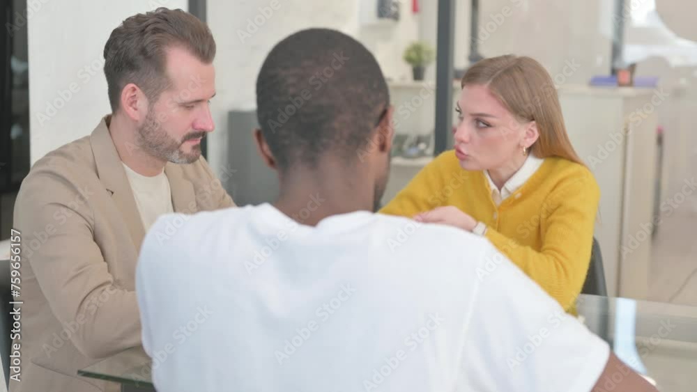 Angry Woman Talking with Multi Ethnic Teammates, Upset