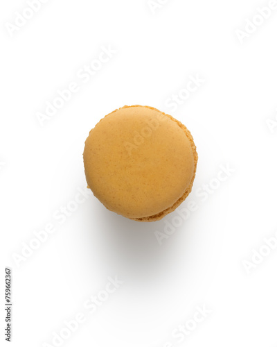 Orange french macaron top view isolated on white with shadow