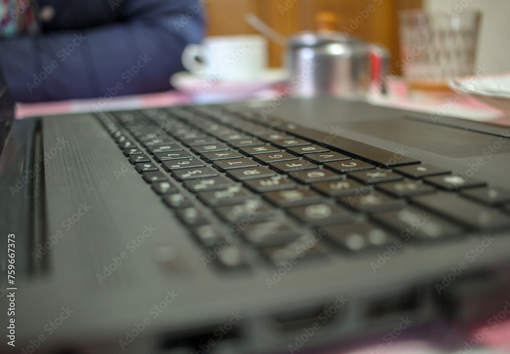 laptop on the table at the coffee hour laptop on the table at the coffee hour