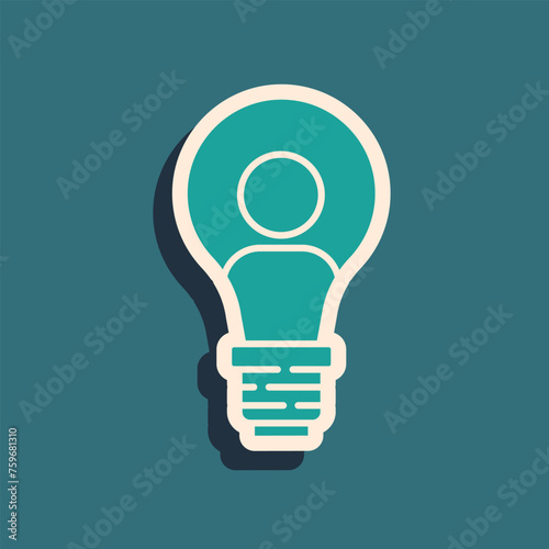 Green Human head with lamp bulb icon isolated on green background. Long shadow style. Vector